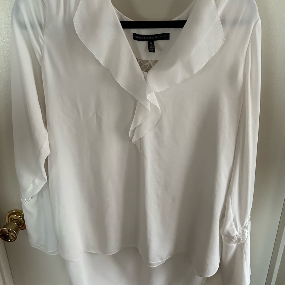 White House Black Market white semi sheer blouse.